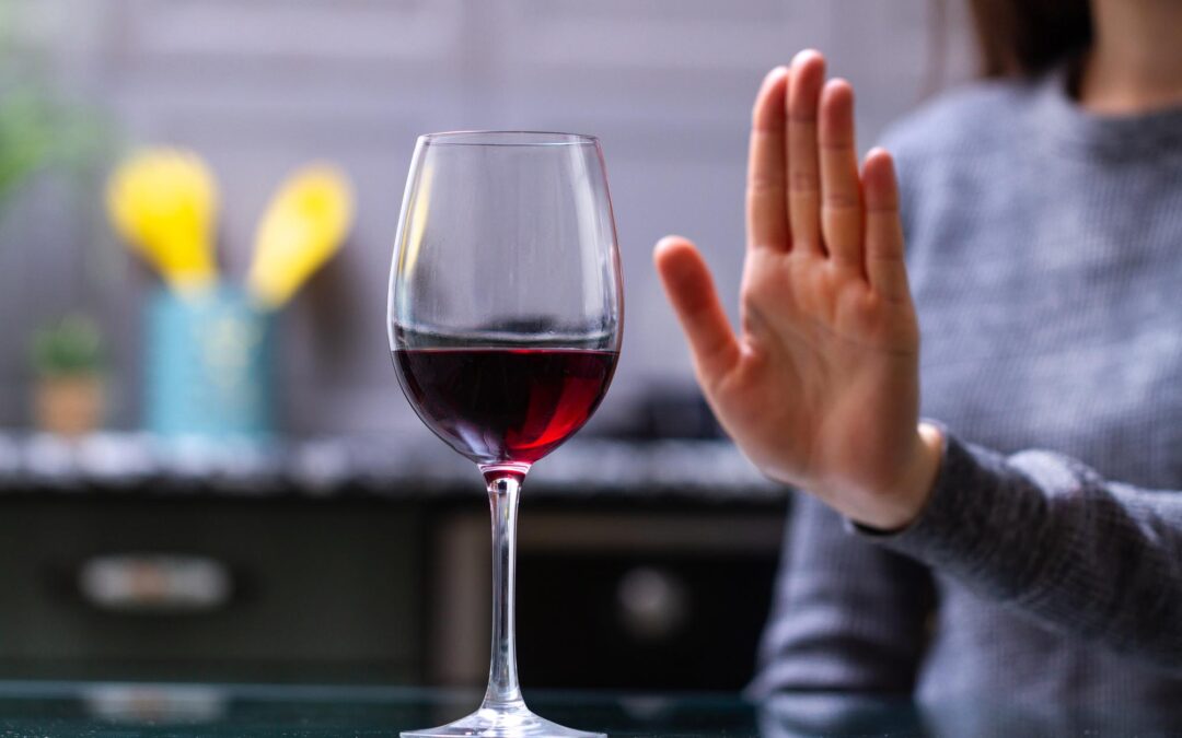 Woman refuses to drink alcohol, Alcohol Awareness Month